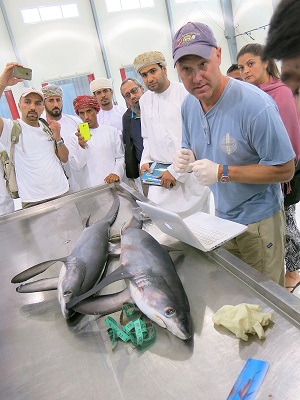 John Carlson provides training at the fish market