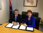 New Zealand signs the MOU - Nathan Guy (Minister for Primary Industries) and Maggie Barry (Minister of Conservation)