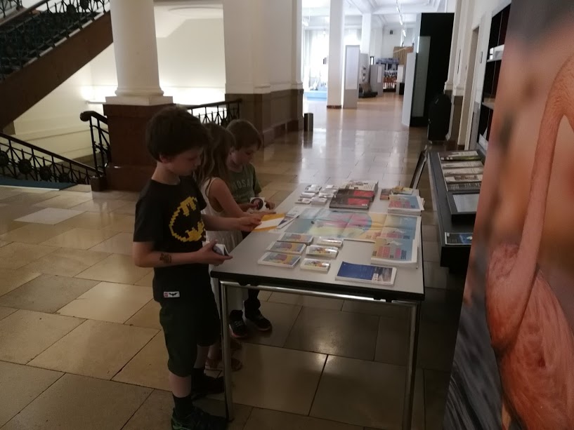 Kids interested in World Migratory Bird Day materials before the film screening at the Museum Alexander Koenig