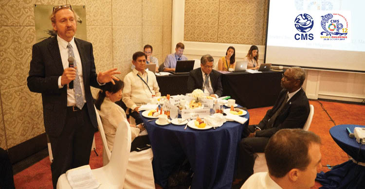 Dr. Bradnee Chambers, CMS Executive Secretary speaking during the leader's breakfast © Aydin Bahramlouian