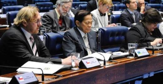 Bradnee Chambers (left) addresses the Brazilian Senate